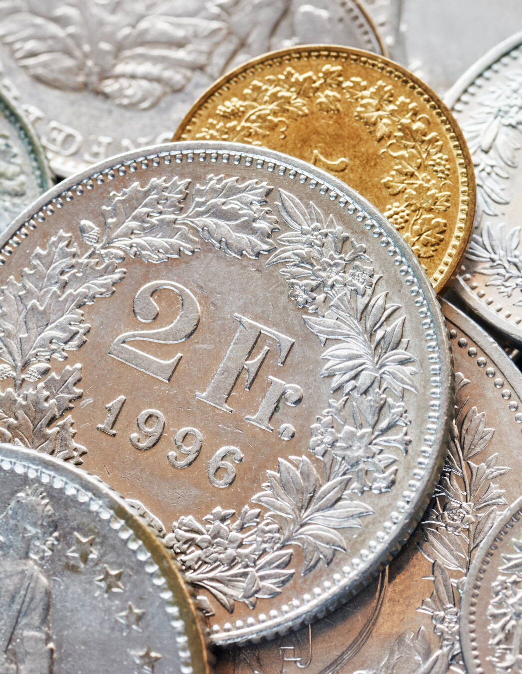 L’image montre différentes pièces suisses – un symbole de la contribution financière modeste qui crée une réelle valeur ajoutée pour vous et pour beaucoup d’autres.